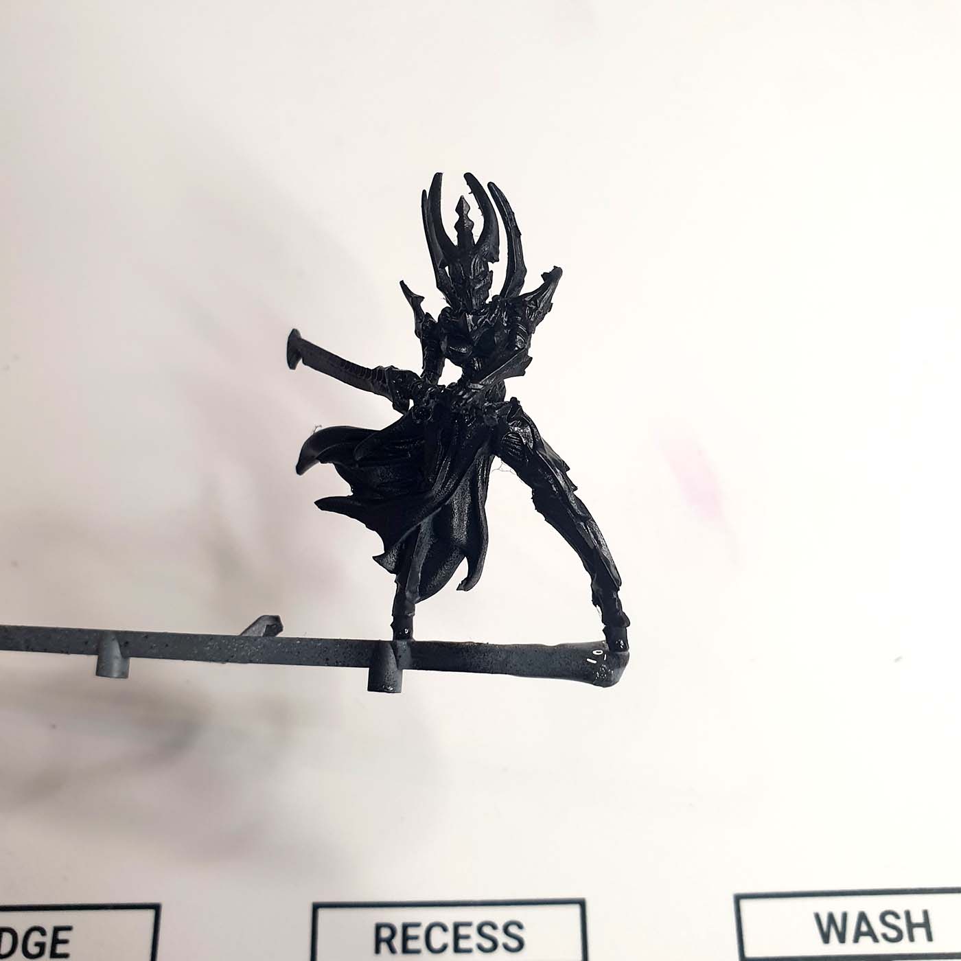 painting miniatures space elves Raging Heroes Void Elf Raider black primer stage